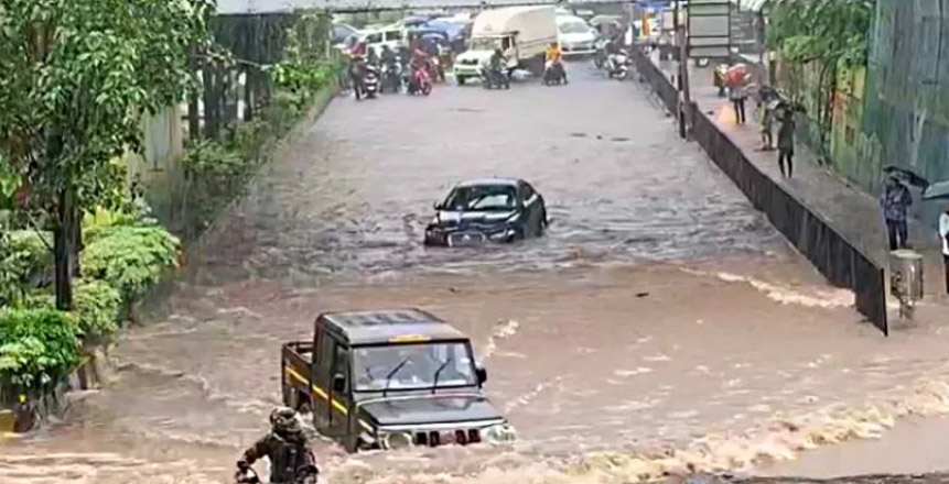 Clip on Bolero driving past Jaguar in Mumbai rains goes viral