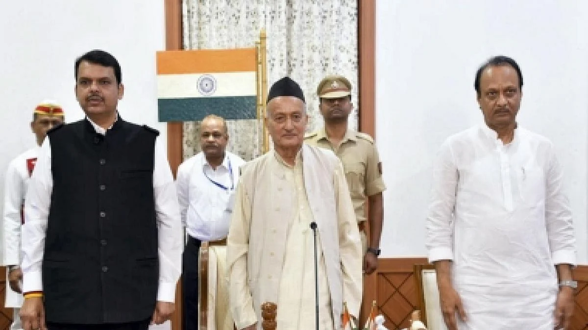Devendra Fadnavis (left) and Ajit Pawar with Maharashtra Governor Bhagat Singh Koshyari after taking oath of office on Saturday, Nov 23, 2019.