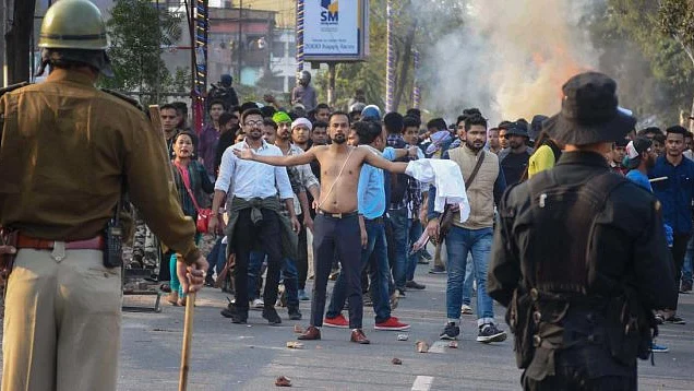 Thousands of people defied curfew in Guwahati on Thursday and took to streets, protesting against the Citizenship Amendment Bill. (PTI photo)