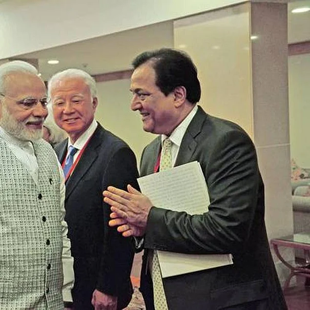 (Left) PM Narendra Modi with (Right) Rana Kapoor