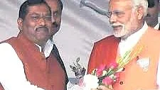 (Left) Shyam Prakash with (Right) PM Modi