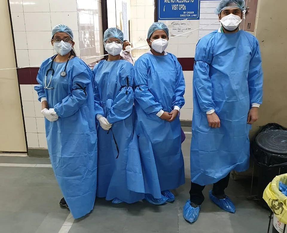 Medics hold ‘black ribbon’ protest against new quarantine guidelines
