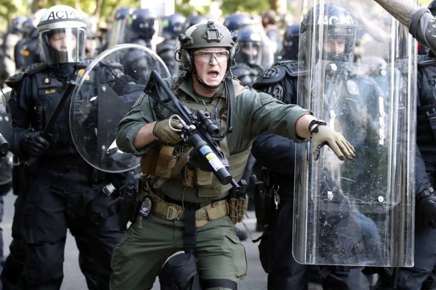 Trump threatens to use military to quell violent protests across US