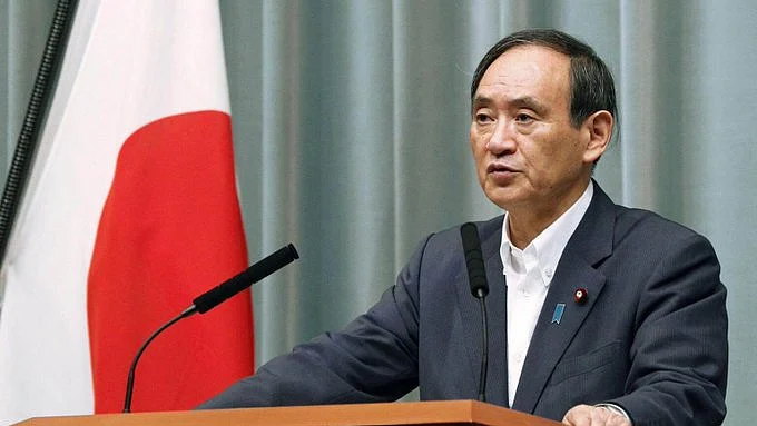 Yoshihide Suga wins party vote for Japan prime minister