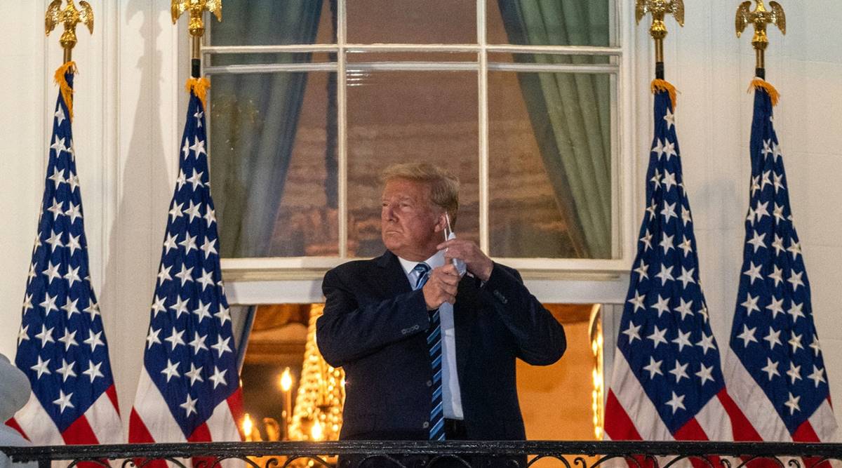 Trump returns to White House after 4-day stay at hospital, removes mask
