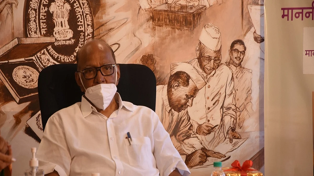 A year after seeking votes in pouring rain, Pawar consoles flood victims