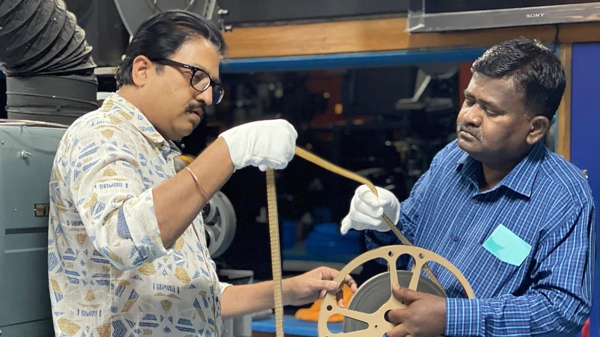 Prakash Magdum, Director, NFAI and Kiran A. Dhiwar, Film Preservation Officer, NFAI with a rare discovered reel on the making of Pakeezah