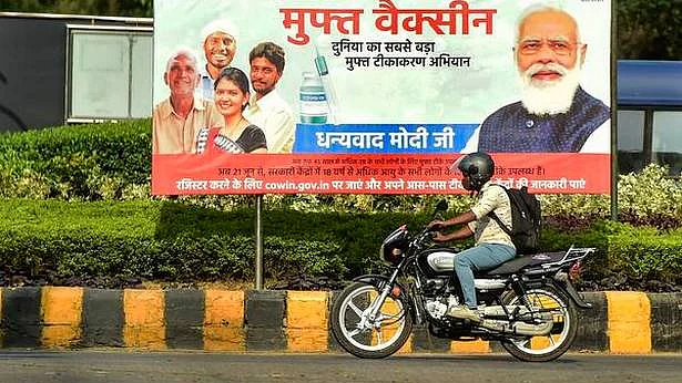 A hoarding thanking PM Modi for "free" Covid vaccine