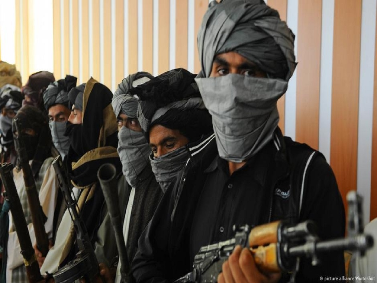 Witness: Taliban hang dead body in Afghan city's main square