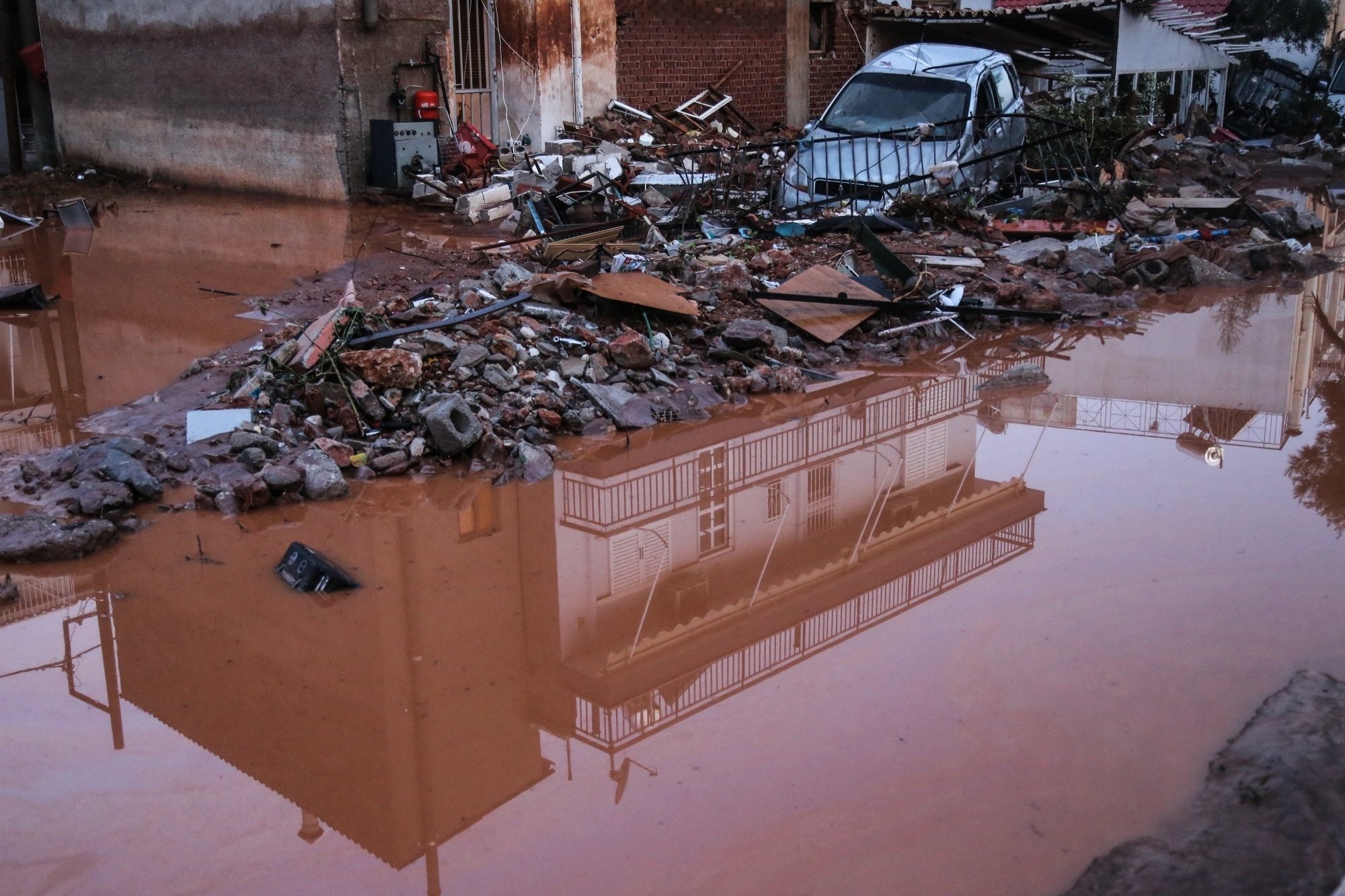 Greece swept by torrential rains, 100 people evacuated in fire-stricken island
