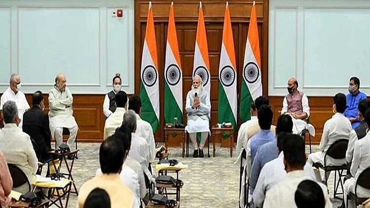 Modi with would-be ministers ahead of cabinet reshuffle in July