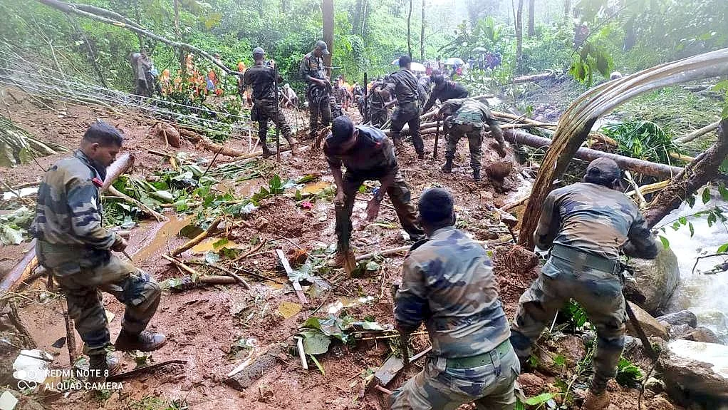 Madras Regiment jawans carry out rescue operation at Kavali Village, 4 km from Koottickal