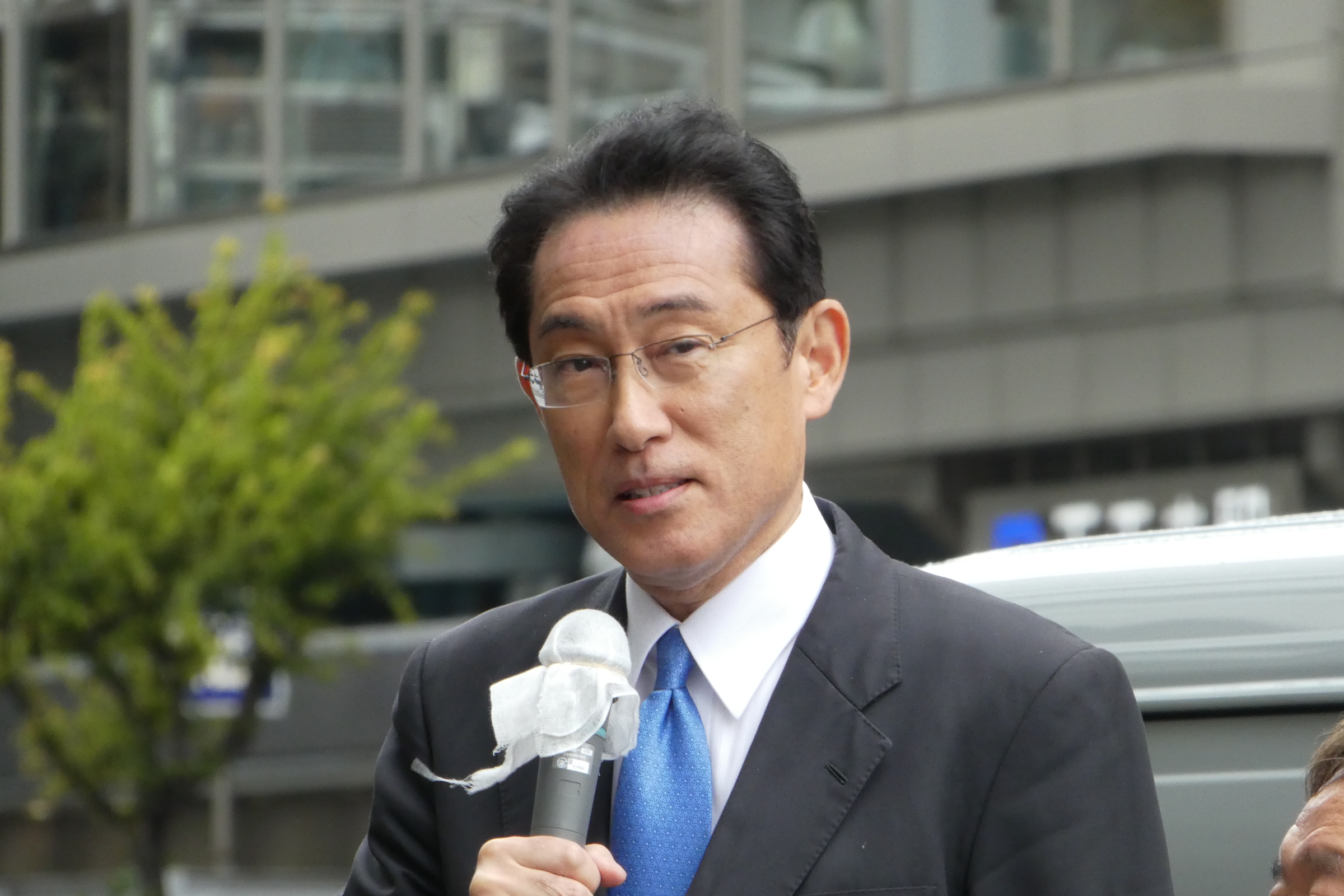Japan's Parliament elects former diplomat Kishida as new PM