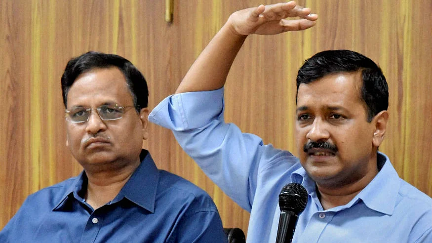 Arvind Kejriwal and Satyendar Jain (left)