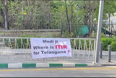 TRS banners with 17 questions greet Modi in Hyderabad