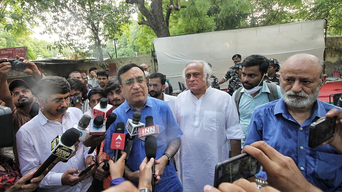 Congress leaders Ajay Maken and Jairam Ramesh at the protest site