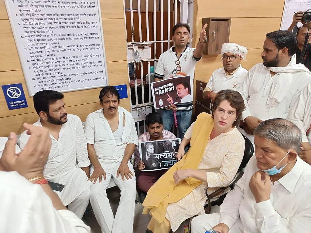 Priyanka Gandhi among other senior leaders of the Congress at Tughlaq Road police station