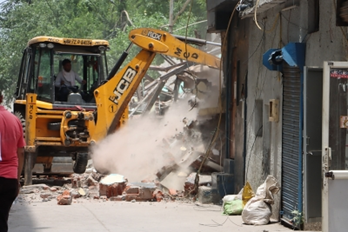 Bulldozer razes shops outside Samajwadi Party office in Lucknow