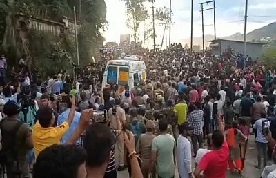 Crowds block the road as Ankita's body is taken for last rites