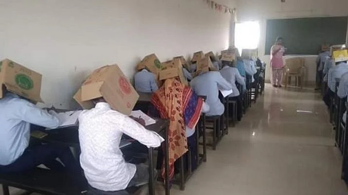 गजब! नकल रोकने के लिए इस राज्य ने निकाला नायब तरीका, छात्रों को पहना दिए गत्ते के डिब्बे