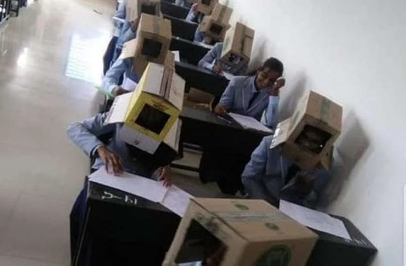 गजब! नकल रोकने के लिए इस राज्य ने निकाला नायब तरीका, छात्रों को पहना दिए गत्ते के डिब्बे