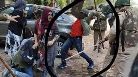 छात्रों पर लाठियां बरसा रहे लाल शर्ट वाले शख्स को लेकर उठ रहा सवाल, लोग पूछ रहे उसकी पहचान