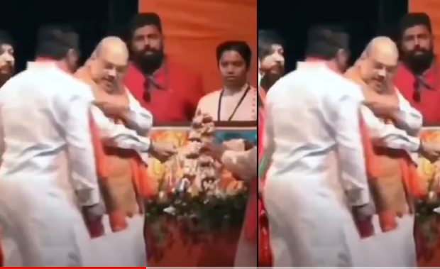 अमित शाह जला रहे थे दीप तभी कैमरे के बीच आ गए बाबुल सुप्रियो, फिर हुए उंगलियों के इशारे और... देखें वीडिया