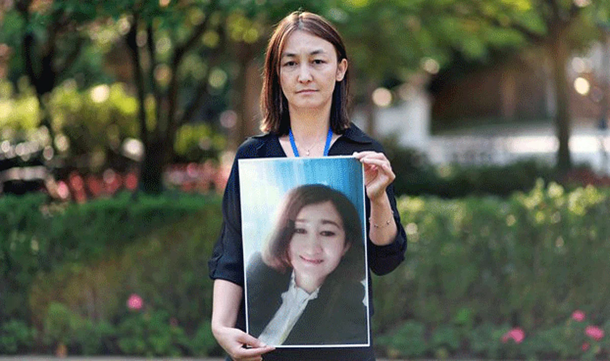 China warns overseas Uyghurs to keep quiet during UN visit