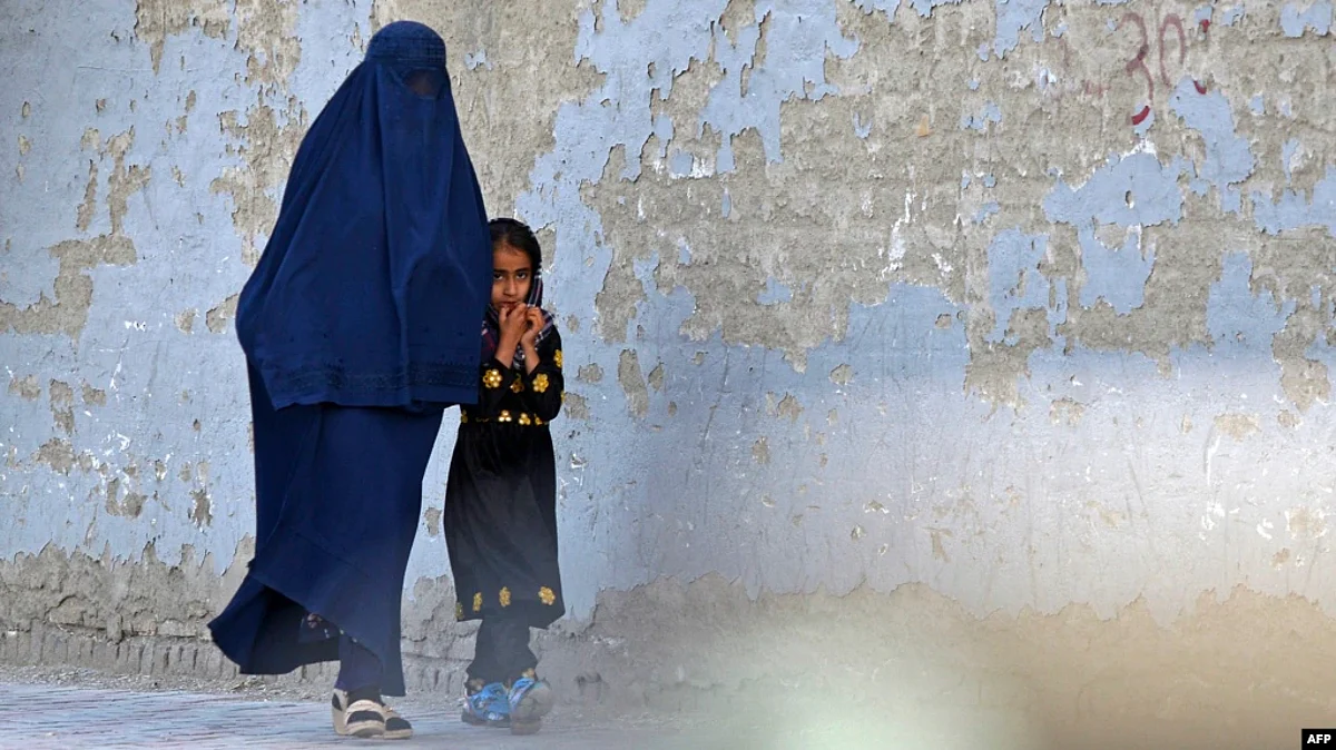 Afghan women resistant, many feel 'enslaved' by the order to cover their faces