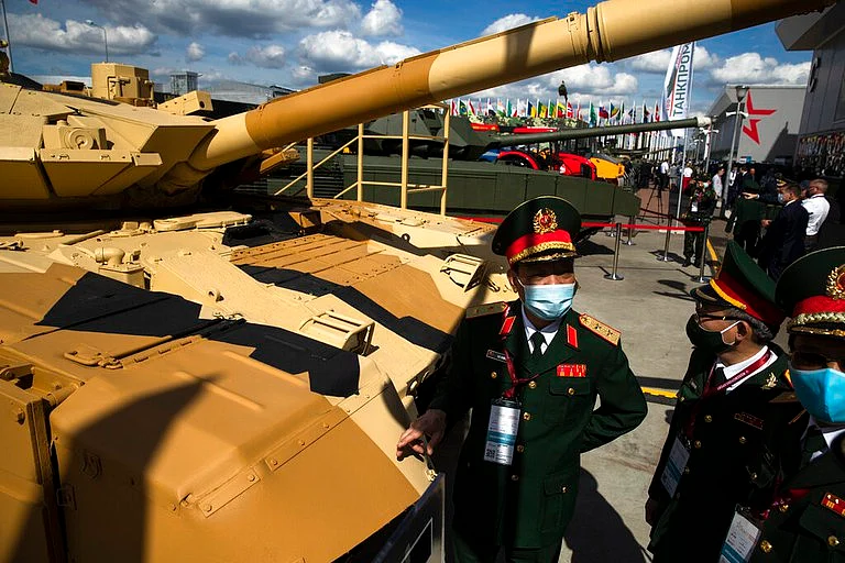 Military visitors of Vietnam observe a Russian T-90MS tank during the International Military Technical Forum Army-2020 in Alabino, outside Moscow, Russia, Aug. 23, 2020. (AP Photo)