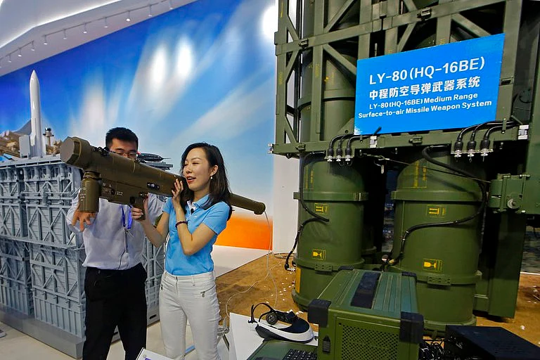 A medium range surface-to-air missile weapon system is displayed during the 12th China International Aviation and Aerospace Exhibition in Zhuhai city, south China's Guangdong province, on Nov. 6, 2018. (AP Photo)