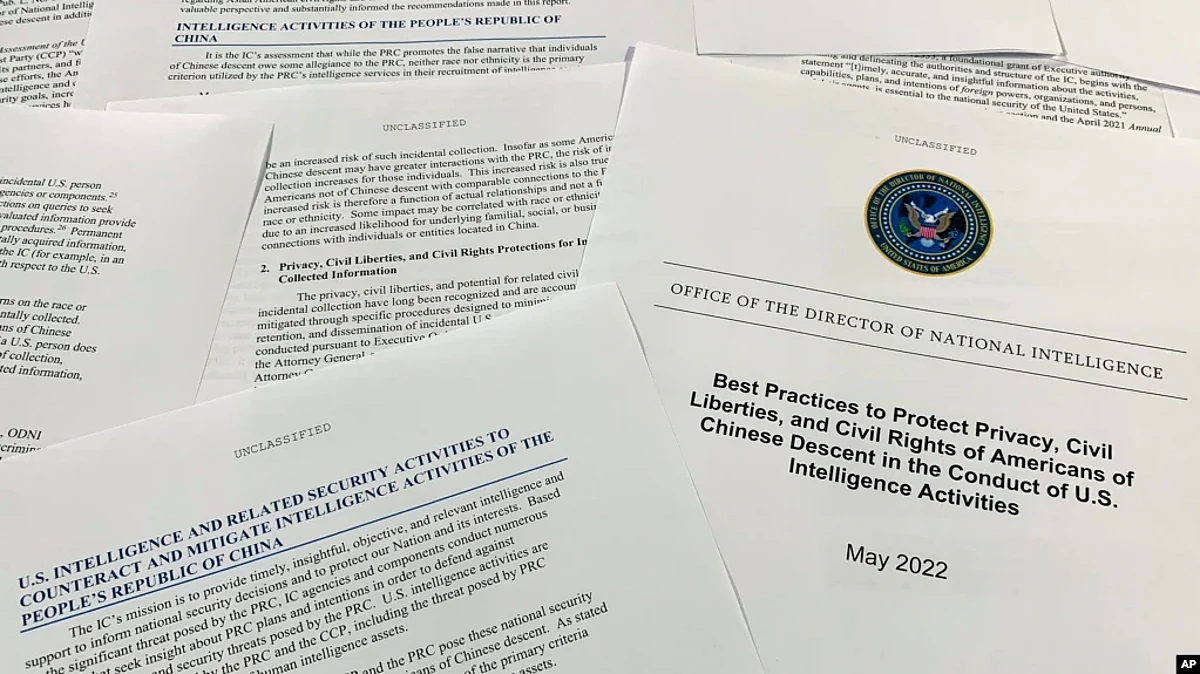 A photo, taken June 14, 2022, of a report by the Office of the Director of National Intelligence. U.S. officials acknowledge that, while U.S. agencies gather information about China, they also might end up collecting information about Chinese Americans.