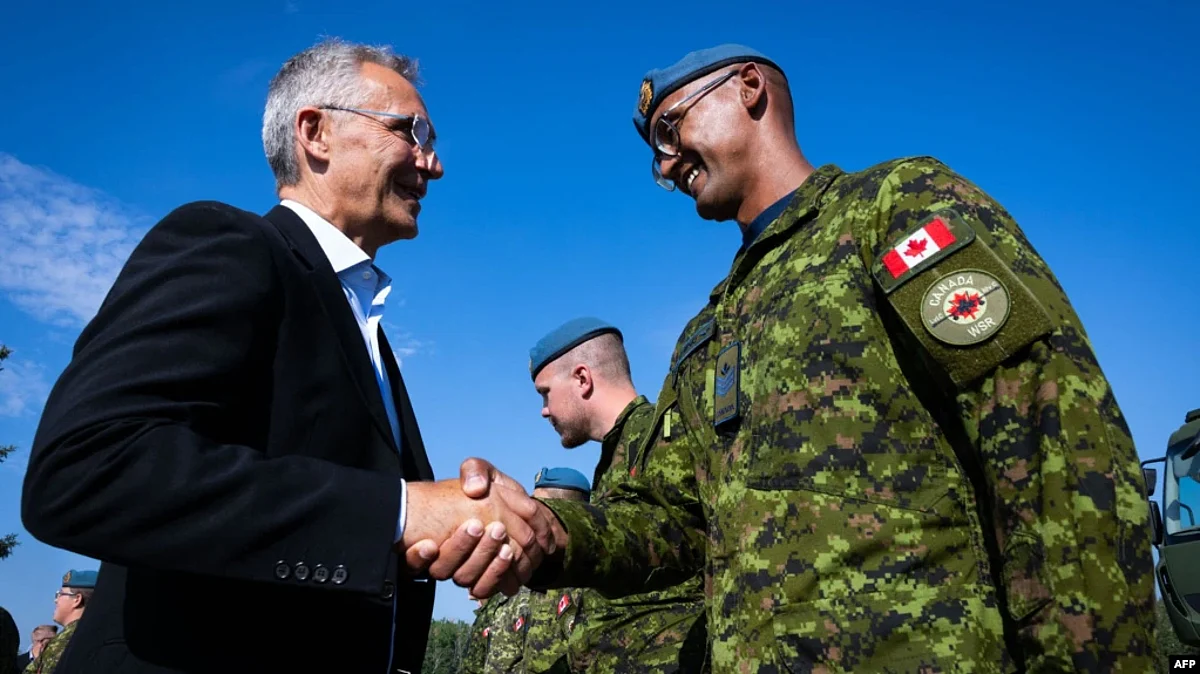 NATO Secretary-General Jens Stoltenberg meets the members of the Canadian armed forces at the Royal Canadian Air Force base in Cold Lake, Alberta.