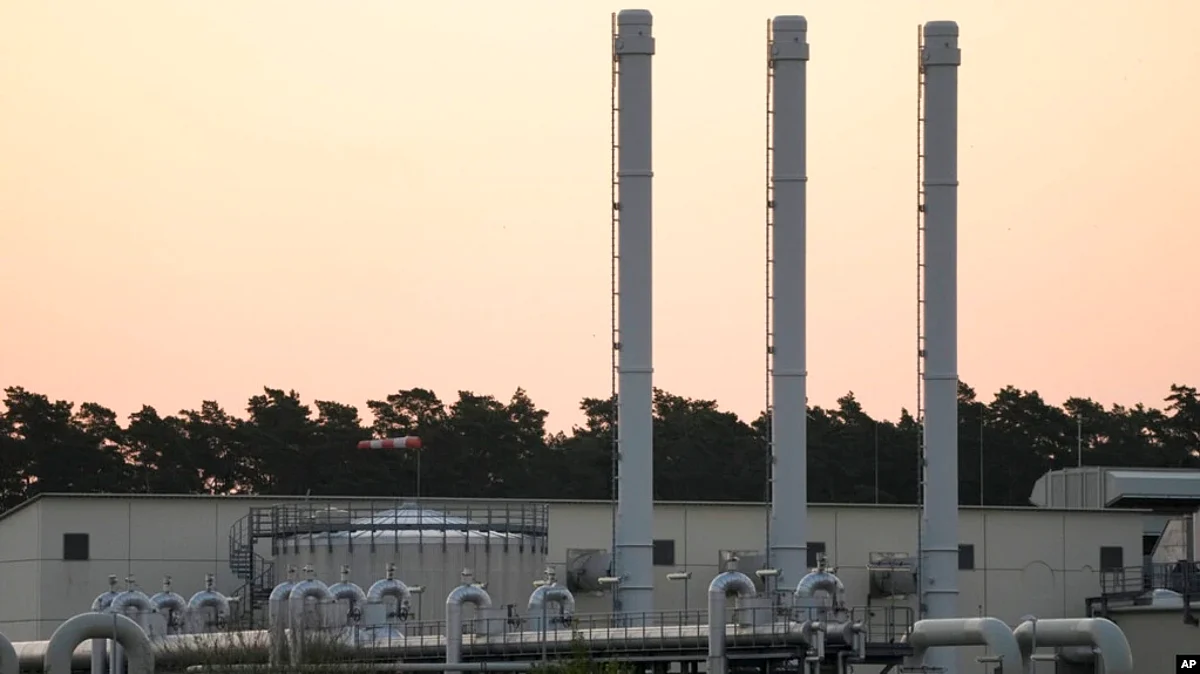 The sun rises behind the landfall facility of the Nord Stream 1 Baltic Sea pipeline and the transfer station of the OPAL gas pipeline, the Baltic Sea Pipeline Link, in Lubmin, Germany, July 21, 2022.