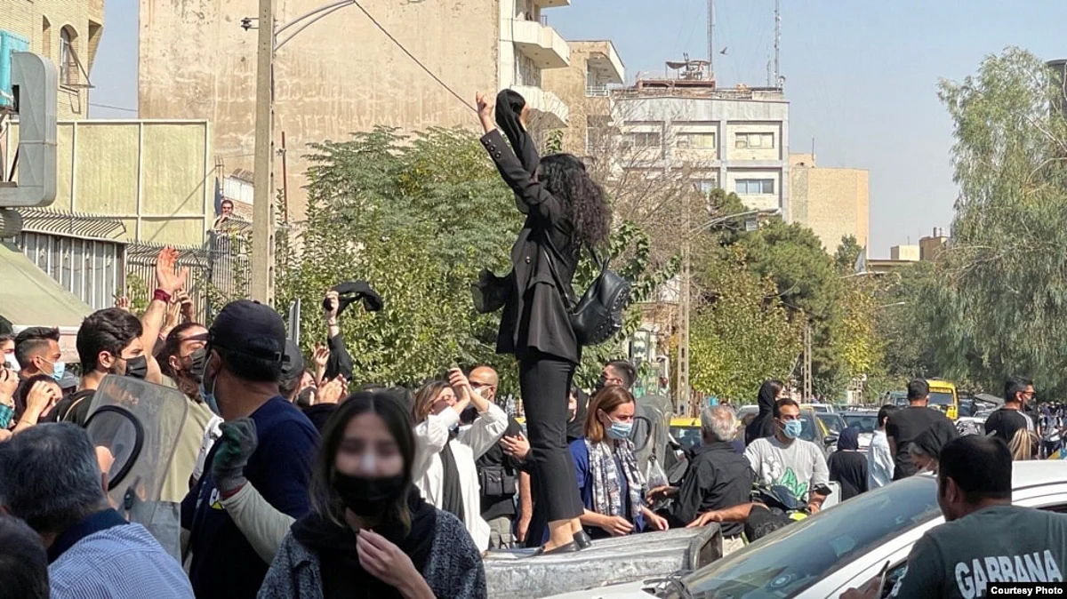 Protesters rally in Tehran on October 2. Iran has seen a rare outburst of sustained public anger, driven in large part by women.