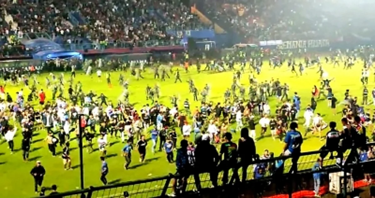 The stampede started due to the resentment shown by the fans of the losing side.