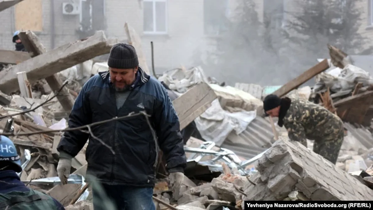 Rescuers work at the site of a maternity hospital hit by a Russian rocket strike in Vilnyansk on November 23.
