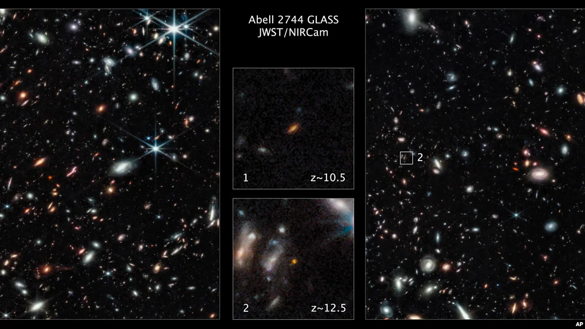 This image made available by the Space Telescope Science Institute Nov. 17, 2022, shows two of the galaxies captured by the James Webb Space Telescope in the outer regions of the giant galaxy cluster Abell 2744. (NASA; ESA; CSA; Tommaso Treu, UCLA; Zolt G. Levay, STScI, via AP)
