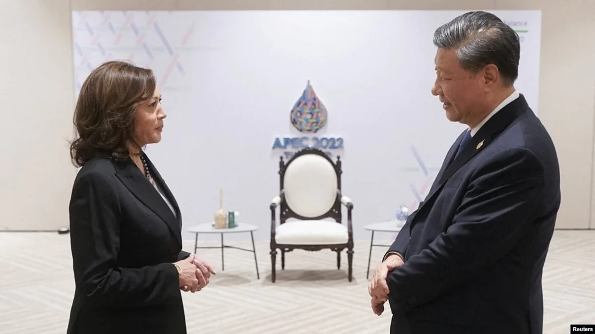 U.S. Vice President Kamala Harris greets China's President Xi Jinping before the APEC Leaders' Retreat in Bangkok, Thailand, Nov. 19, 2022. (The White House/Handout via Reuters)