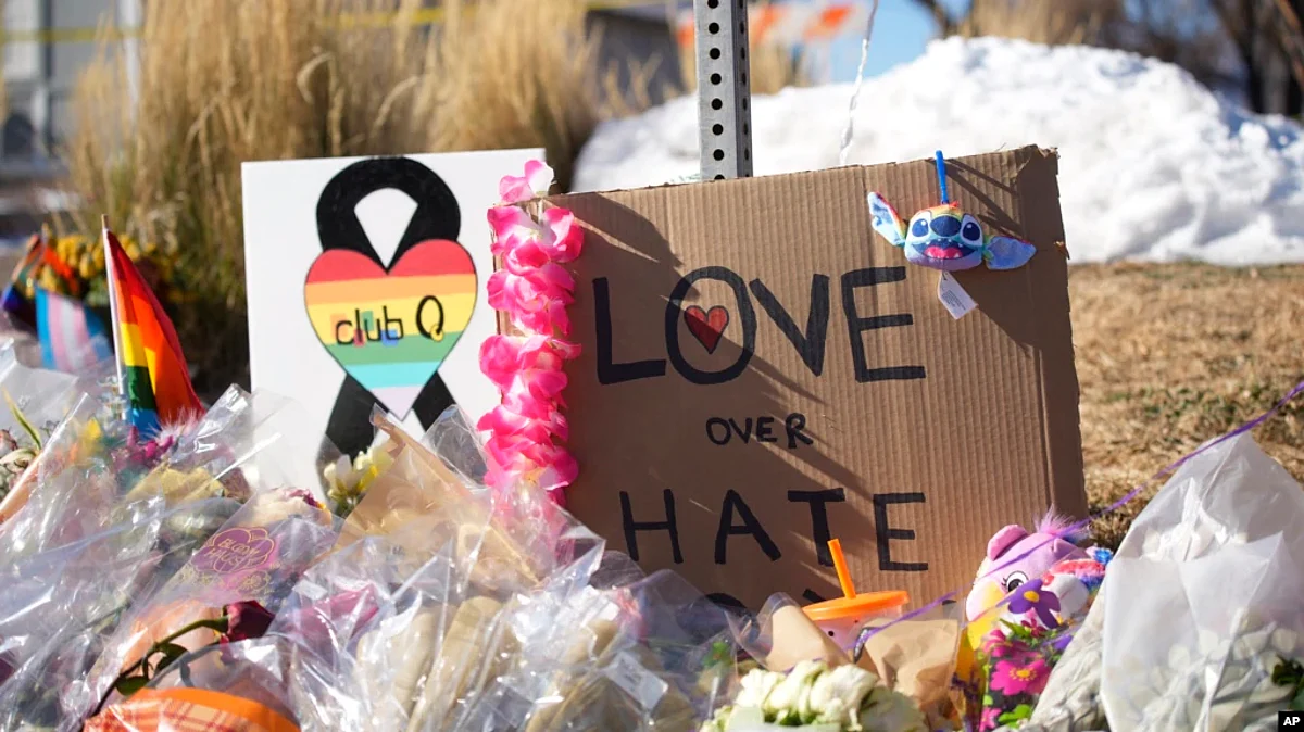 FILE - Bouquets of flowers sit on a corner near Club Q, the site of a Gay club shooting the day before in Colorado Springs, Colo., on Nov. 21, 2022. (AP)