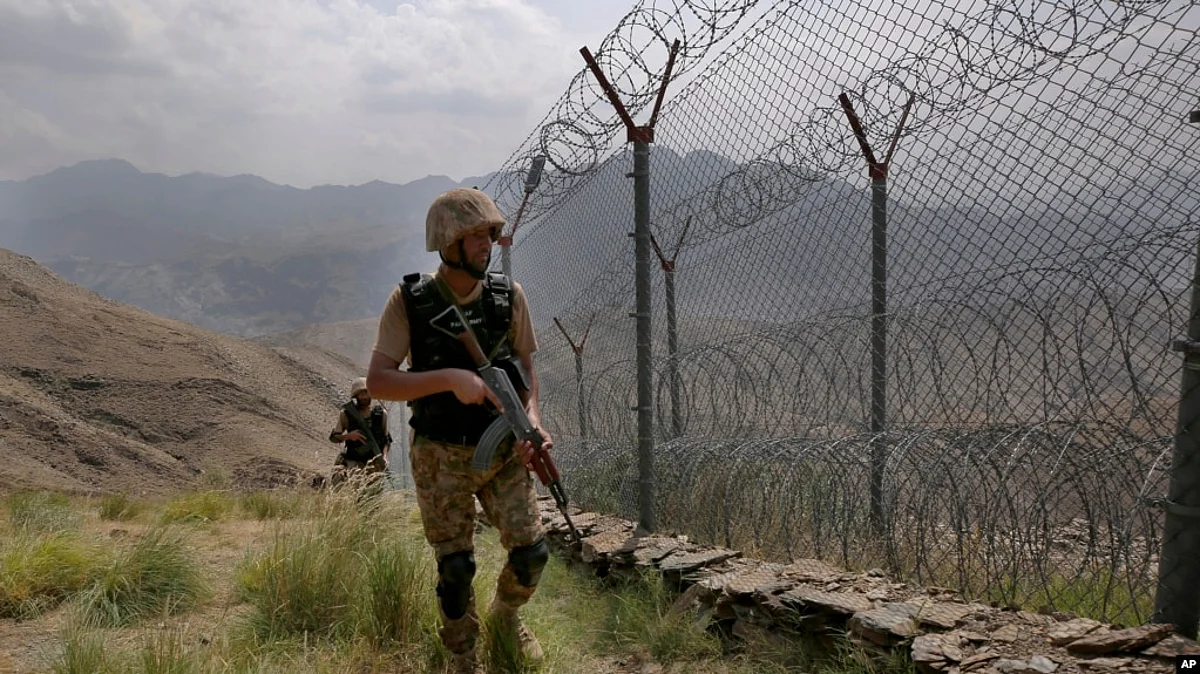FILE - In this Aug. 3, 2021 file photo, Pakistan Army troops patrol the Pakistan-Afghanistan border. Pakistan warned Dec. 1, 2022, that cross-border terrorism emanating from Afghanistan “is both alarming and dangerous” for regional peace. (AP)