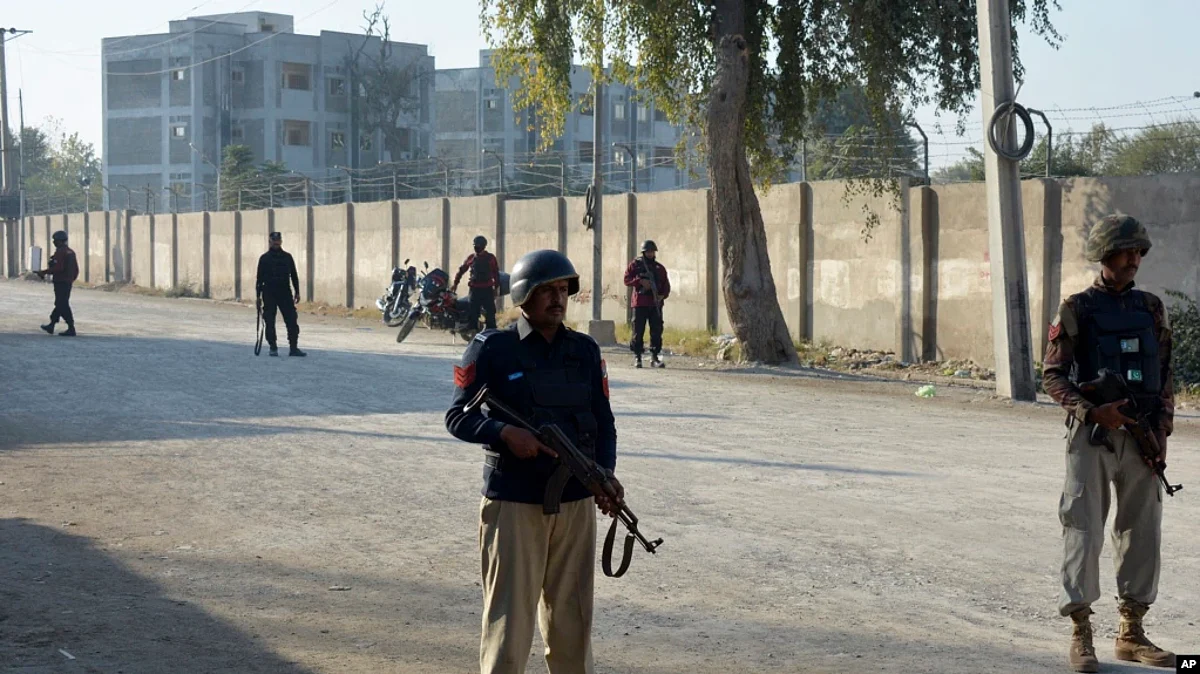 FILE - Security officials guard a blocked road leading to a counter-terrorism center after security forces starting to clear the compound seized earlier by Pakistani Taliban militants in Bannu, a northern district in the Pakistan's Khyber Pakhtunkhwa province. (AP)