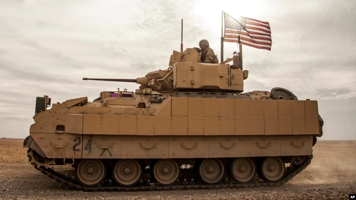 FILE - American soldiers drive a Bradley Fighting Vehicle during a joint exercise with Syrian Democratic Forces in northeastern Syria, Dec. 8, 2021. The U.S. will be sending Bradleys to aid Ukraine in its battle against Russian invaders. (AP)