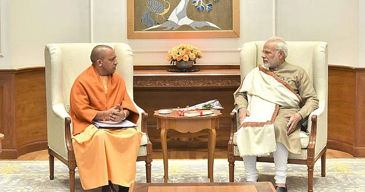 मुख्यमंत्री योगी आदित्यनाथ और प्रधानमंत्री नरेंद्र मोदी। (Wikimedia Commons)