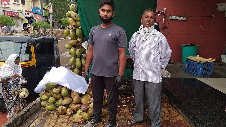 Coconut seller Sanjit Ravidas (left) and Sunil Pagare, a waiter. Both have been struggling since the lockdown began in March.