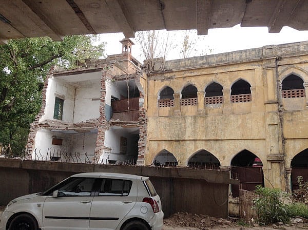 The partially demolished school