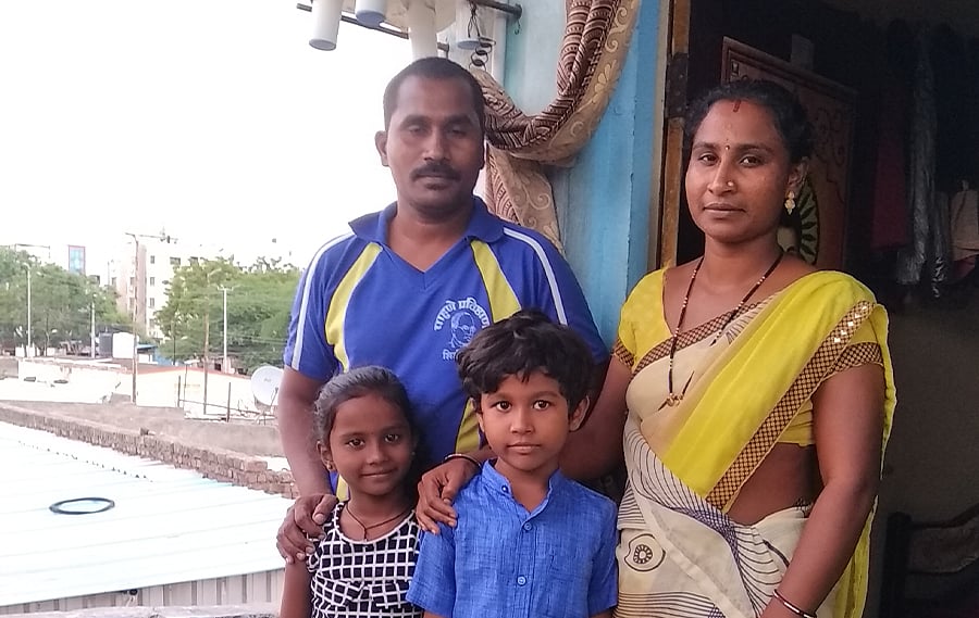 Nitin Kadam, who works as a waiter in Shirdi, with his family.