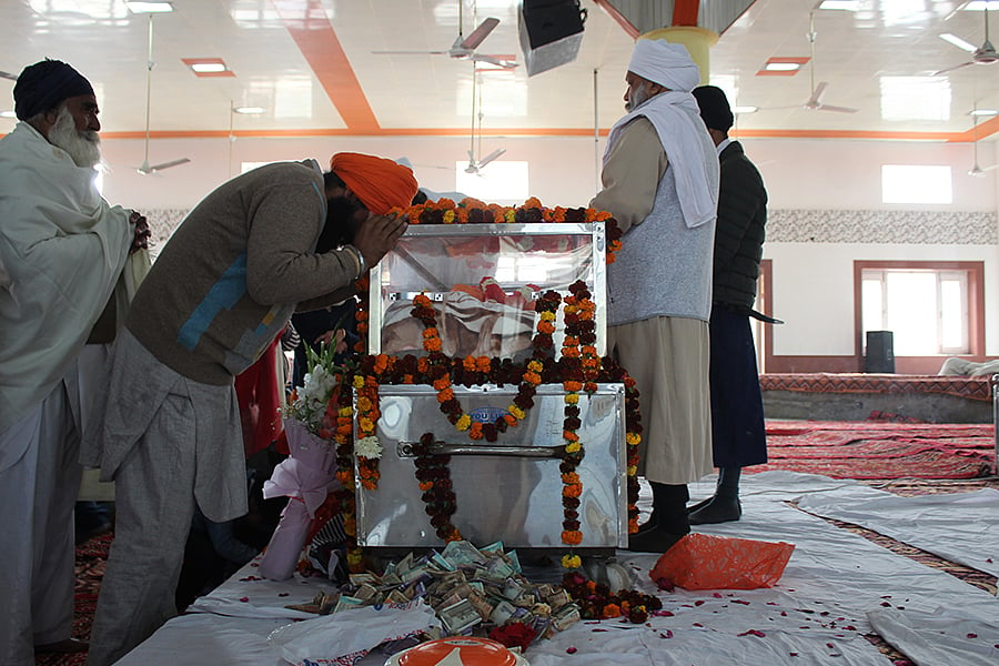 Devotees pay tribute to Baba Ram Singh at Nanaksar gurudwara.