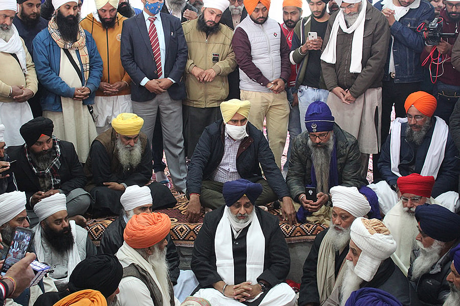 Sukhbir Singh Badal with Baba Ram Singh’s associates and followers at the Nanaksar gurudwara.