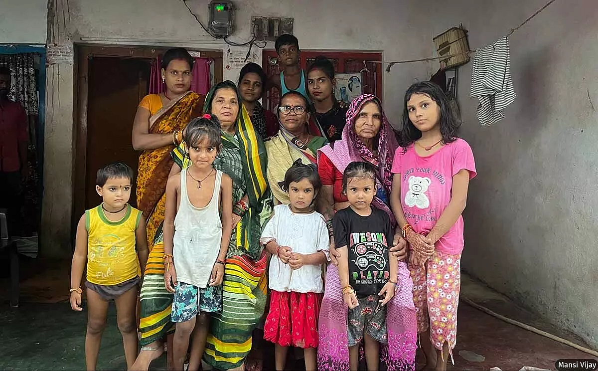 Manorama sits beside her family, all of whom, aged between 3-72 years, have completed their dose of preventive medicines as part of the MDA round conducted in Lucknow in February 2024.